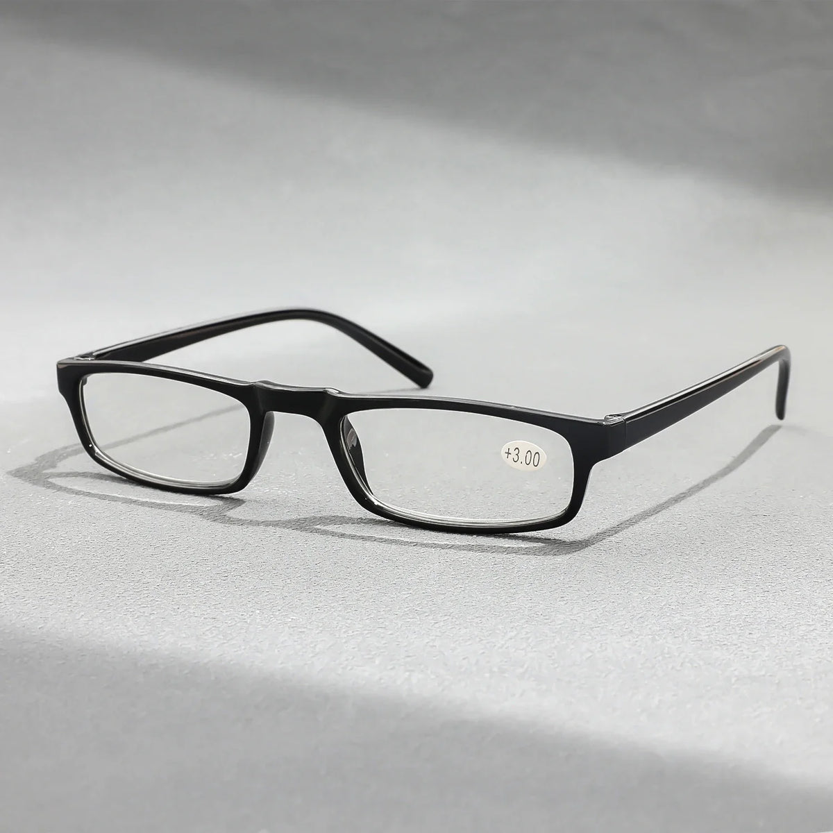 Lentes de lectura de marco negro rectangular